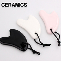 Guasha blanc céramique Gua Sha visage rose Roller Guasha board