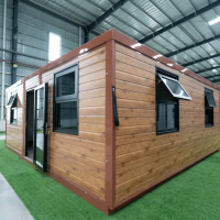 Maison conteneur extensible marron de 20 pieds à double aile, préfabriquée et modulaire, pour bureau de jardin ou glamping
