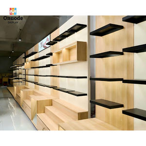 Modern Stainless Steel Clothing <b>Display</b> Racks | <b>Wall</b>-Mounted & Island Garment <b>Cabinets</b> | Custom Boutique Retail Fixtures - Product Image 3