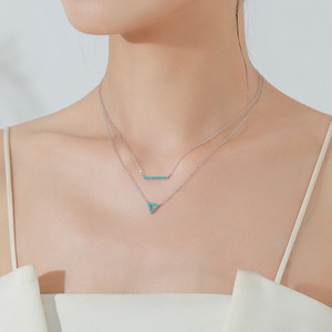 Collar con colgante minimalista de plata de ley S925 con turquesa de corte redondo y diseño calado triangular, versión de cobre personalizable para mujer - Product Image 2