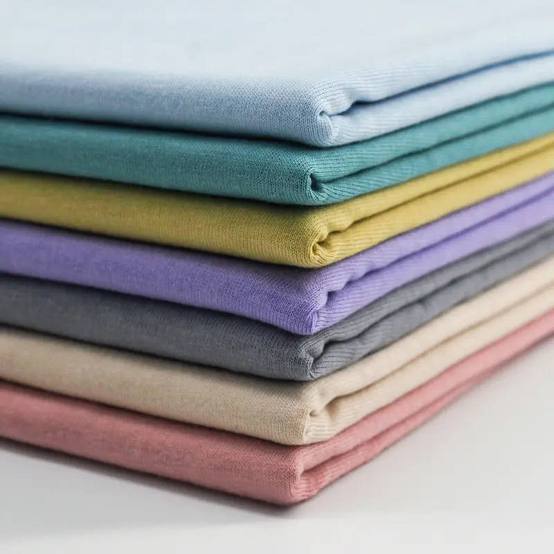 Ramah lingkungan pakaian dalam Tunggal kaus kain 100% katun Jersey kain kemeja polos OEM ODM untuk pakaian anak-anak rajut padat