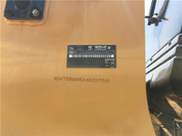 Chargeuse lourde Caterpillar 966H d'occasion avec godet pour travaux routiers et manutention de matériaux en vrac