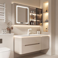 Ensemble de meuble-lavabo de salle de bain moderne de couleur crème avec vasque en céramique intégrée, miroir, armoire et coiffeuse