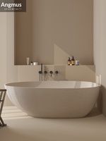 Baignoire artistique en travertin de style Wabi-Sabi, en pierre artificielle, autoportante, élégante, en forme d'œuf, pour maison, hôtel, B&B