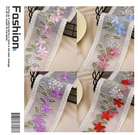 Accessoires vestimentaires et articles de décoration en tissu réseau brodé coloré