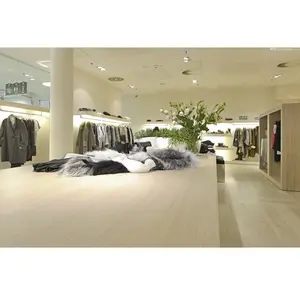उच्च स्तरीय कपड़ों की दुकान फिक्स्चर कपड़े की दुकान रैक आयोजक लेडी गारमेंट शॉप डिजाइन OEM