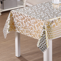 Nappe en PVC RNPT avec imprimé floral doré et bordure à motifs, avec support en tissu pour tables à manger