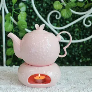 Elegante in rilievo nuova porcellana di osso teiera riscaldata con più caldo per il tè set Romantico dolce di stile