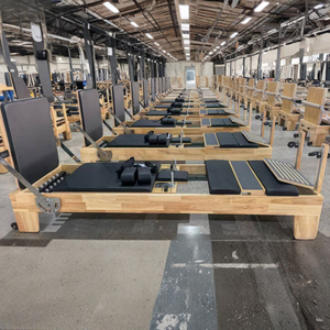 Machine de Pilates Reformer en bois de chêne durable, logo personnalisé, couleur, utilisation à domicile, studio - Product Image 1