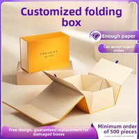 Boîte cadeau rigide pliable haut de gamme personnalisée en forme de livre avec fermeture magnétique, impression UV/estampage à chaud, poignée et ruban, accessoires inclus