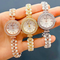 Montre à quartz en alliage pour femme, élégante et simple, ornée de diamants, avec bracelet en perles, forme cœur, ovale ou carrée, style luxe léger, à prix abordable