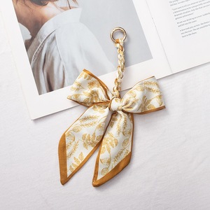 Fabrieksgroothandel Hoge Kwaliteit Mode Lint Sleutelhanger Strik Sjaal Hangertje voor Dames Meisjes - Product Image 5
