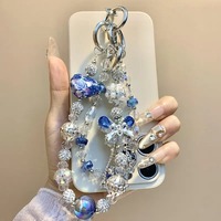 Breloque de téléphone papillon bleu en strass et perles, pendentif de sac artisanal lourd, cordon de poignet, cadeau bijou pour femme