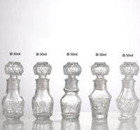 Cadeau personnalisé pour faveurs de mariage Mini bouteille de parfum d'alcool Vide 50ml Petite bouteille de vin en verre fantaisie Carafe avec couvercle en verre Vente en gros