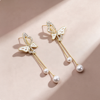 Boucles d'oreilles pendantes tendance en alliage avec fleurs, perles simulées, style bohème, longues, pour femme, bijoux de fête et de vacances
