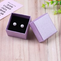 Boîte à bijoux en carton de mode en gros matériaux recyclés pour couvercle de stockage de clous d'oreille et boîte de papier de base caisse d'emballage
