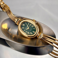 Montre à quartz élégante pour femme, design rétro exquis avec cadran ovale et chiffres romains, accompagnée d'un bracelet en acier allié PRO22
