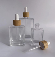 Flacon compte-gouttes en verre transparent carré pour cosmétiques fantaisie de 30 ml, 50 ml, 100 ml avec pipette en bambou