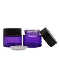 Großhandel Leere Lila Glas-Hautpflege-Tiegel mit Schwarzem, Goldenem oder Silbernem Deckel, Nachfüllbare Gesichtscreme-Glasbehälter 30g 50g 100g