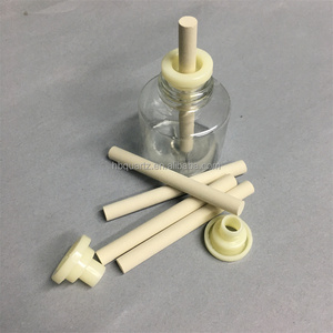 Juego de Repelente de Mosquitos Eléctrico con Mecha de Cerámica Porosa de 7*73mm y Base de Madera - Product Image 1