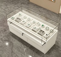 Comptoir de présentation de bijoux en verre blanc minimaliste moderne, vitrine de vente au détail verrouillable avec tiroirs de rangement