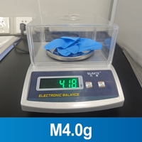 Liquidation vente M4.0g gants jetables en nitrile bout des doigts texturé bleu soins personnels accepter emballage de conception non médical