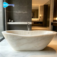 Baignoire ovale autoportante en marbre massif, sculptée à la main, moderne et élégante, durable, pour une utilisation en salle de bain intérieure