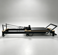 Vente en gros de lit d'entraînement Pilates pliable portable personnalisé noir en alliage d'aluminium pour usage domestique