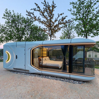 Maison moderne de luxe préfabriquée capsule spatiale petite maison mobile à structure en acier pour les centres de villégiature pittoresques et les chambres touristiques pour les vacances