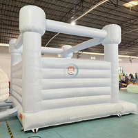 Château gonflable commercial en PVC bleu ciel avec toboggan pour enfants, idéal pour les fêtes de mariage en extérieur
