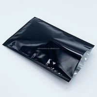 Sacs à couvercle ouvert en feuille d'argent mylar métallique noir pochettes thermoscellées sous vide avec encoches déchirables pochette plate pour biscuits emballage alimentaire