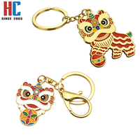 Porte-clés artisanal commémoratif du Festival du Printemps, motif Danse du Lion chinois, en métal émaillé plaqué or moderne, personnalisé, de fabrication usine avec 23 ans d'expérience