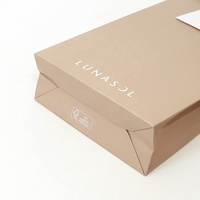 Sac cadeau en papier ivoire écologique personnalisé pour vêtements, bougies et emballages artisanaux avec poignée de longueur d'épaule