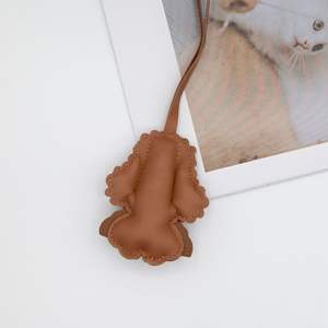 Goreal 2025 nueva llegada bolso de mujer encantos oso de peluche perro juguete caniche cuero muñeca bolso decoración Metal llaveros - Product Image 5