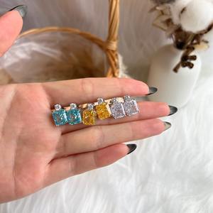 925 स्टर्लिंग चांदी रोडियाम मढ़वाया ब्राइडल आभूषण 8A कुचल बर्फ कट ब्लू पीले वर्ग Baguette जेड घन Zirconia स्टड कान की बाली - Product Image 1