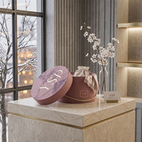 Boîte cadeau ronde de luxe personnalisée avec poignée en corde pour l'emballage de fleurs, les cosmétiques et la présentation de marques de boutiques