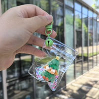 Porte-clés en peluche Père Noël floqué, mini jouet de dessin animé, pendentif sac en PVC transparent DIY Kawaii avec clochette et paillettes