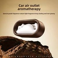 Diffuseur d'aromathérapie pour voiture en forme de chat, à fixer sur la grille d'aération, avec pierre parfumée longue durée, figurine décorative en bois mignonne