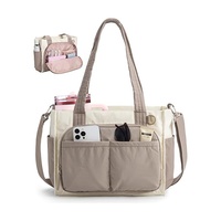 Sac fourre-tout de voyage décontracté et moderne en nylon matelassé OEM avec compartiment pour ordinateur portable et sangle réglable pour enseignants, infirmières et femmes actives