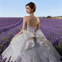 Robe de mariée royale de luxe, coupe oversize, col cœur, en tulle blanc scintillant, avec corset orné de perles brodées à la main