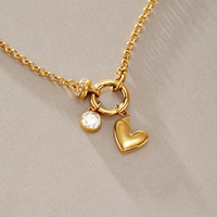 Collier unisexe polyvalent plaqué or 18 carats avec breloques cœur et croix amovibles en cristal pavé et fermoir à ressort