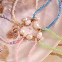 Collier à breloques en acier inoxydable plaqué or OEM Collier ras de cou coloré en perles d'eau douce Sac à chaînes en acier inoxydable