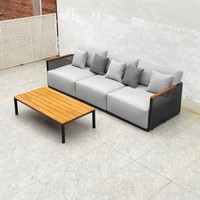 Ensemble de canapé et table basse d'extérieur en acier inoxydable ; Chaises longues de style villa pour hôtel et jardin ; Mobilier décontracté de style nordique