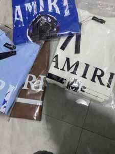 Vêtements de couple décontractés amples à imprimé lettres classiques, marque Amirys, 100 % coton, style hip-hop urbain, pour hommes et femmes - Product Image 4