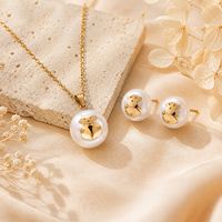 Ensemble boucles d'oreilles et collier intemporel en acier titane avec perles, motif goutte d'eau et clochette, incrustations pour femme