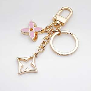 थोक फैशन फूल आकर्षण घड़ी सुंदर श्रृंखला डिजाइन स्टेनलेस स्टील कीचेन - Product Image 3