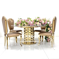 Ensemble de tables et chaises rondes modernes de luxe Base en acier inoxydable nouveau style pour les repas, les événements en plein air, les hôtels et les cuisines