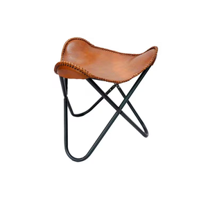 Tabouret papillon en cuir de buffle fait main avec structure en fer pliable, finition vintage et design artisanal pour salon - Product Image 1