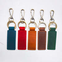 Mousqueton de luxe personnalisé en cuir avec anneau, breloque promotionnelle pour sac, accessoires, design unique de pendentif clé, étanche et écologique