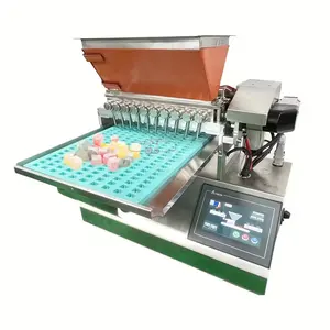 verkaufsschlager aktualisierte desktop-gummibärchen-einlagenmaschine tischplatte gummibärchen-einlagen kleine schokolade-bonbons-herstellungsmaschine